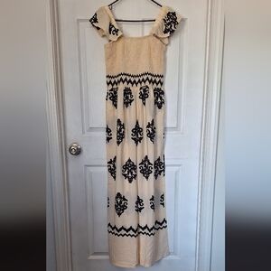 Jumpsuit Cream And Black Smocked With Ruffle Shoulders